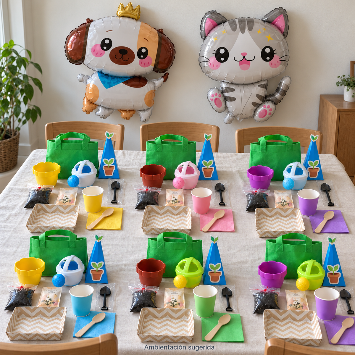 Mesa para seis participantes con kits Eco Exploradores de BOXFEST, materitas, mini regaderas, materiales de siembra y elementos de celebración.